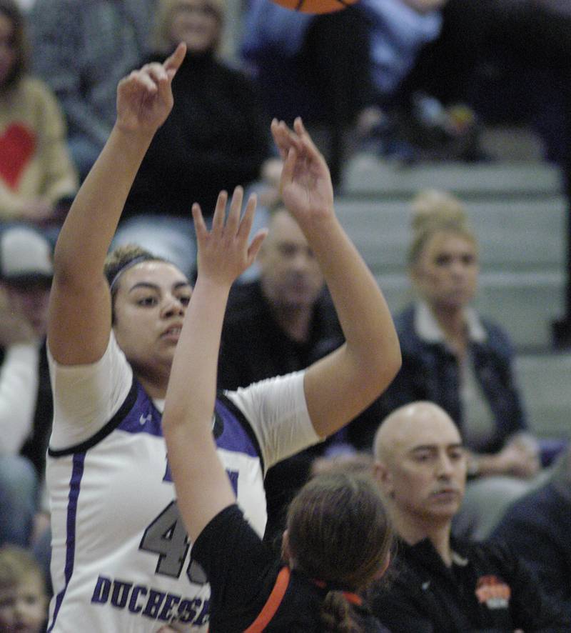 Dixon's Hallie Williamson shoots the ball against a Byron defender. The Dixon Duchesses hosted Byron in girls basketball Saturday, Jan. 25, 2025.