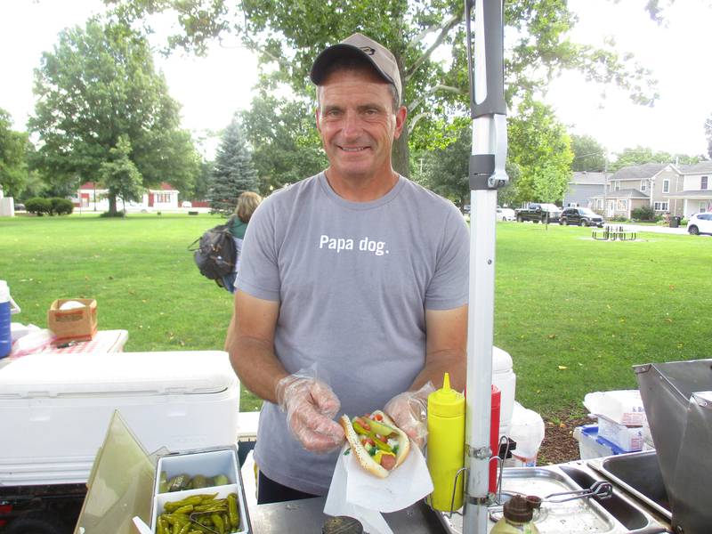 Jeff Hahn of Home Plate Hot Dogs serves up a classic Chicago-style dog from his stand in Yorkville's Town Square Park on Aug. 9, 2022. (Mark Foster -- mfoster@shawmedia.com)
