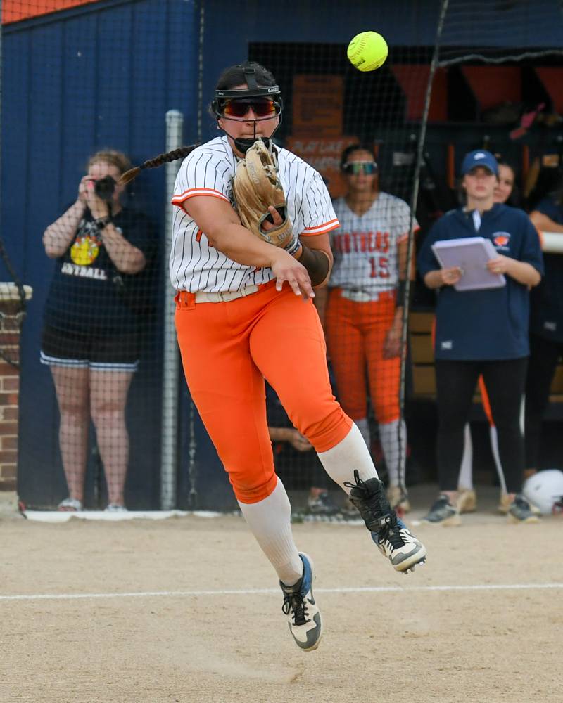 Oswego's Jaelynn Anthony (20) throws out a Yorkville runner at first on Tuesday June 3, 2025, during the sectional semifinal game held at Oswego High School.