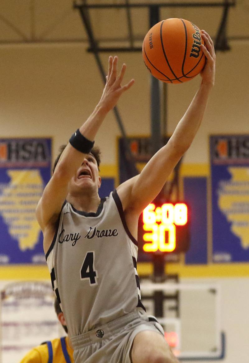 Cary-Grove's Dylan Dumele shoots the ball during a Johnsburg Thanksgiving Tournament boys basketball game against Johnsburg on Monday, Nov. 24, 2025, at Johnsburg High School.