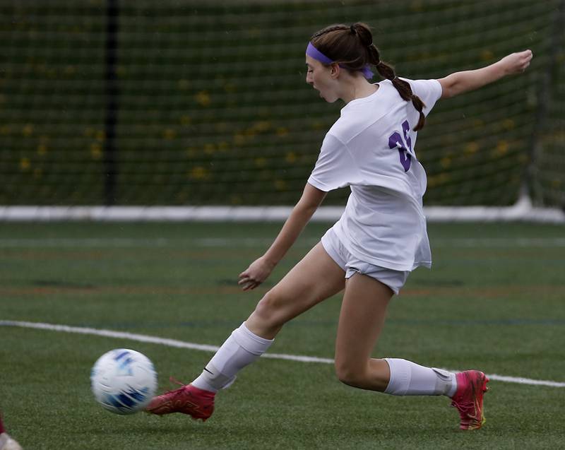 Hampshire's Langston Kelly takes a shot at the goal during a Fox Valley Conference soccer game against Prairie Ridge on Tuesday, April 16, 2024, at the MAC Athletic Complex in Crystal Lake.