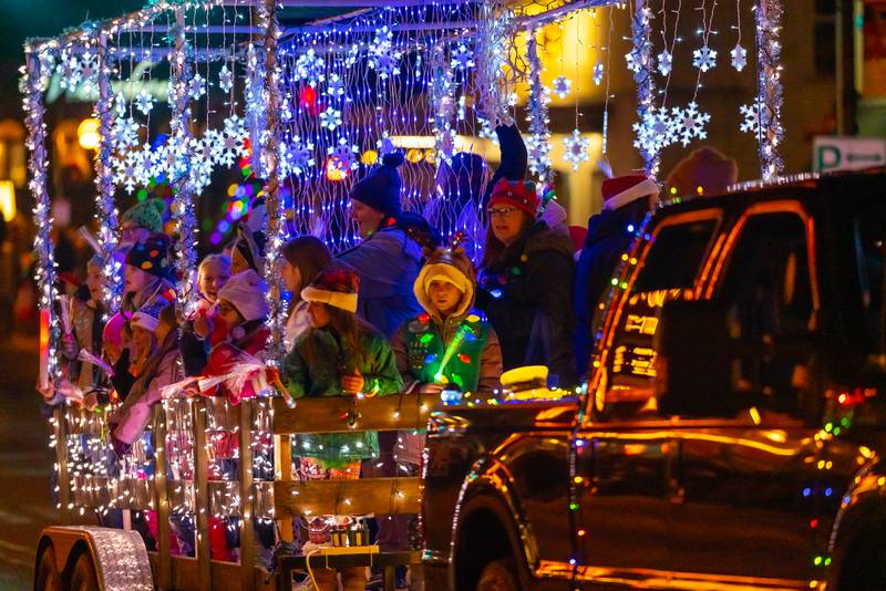 Girl Scouts of Northern, Ill. Fox Valley Service Unit’s Float in the 2022 St. Charles Electric Christmas Parade.