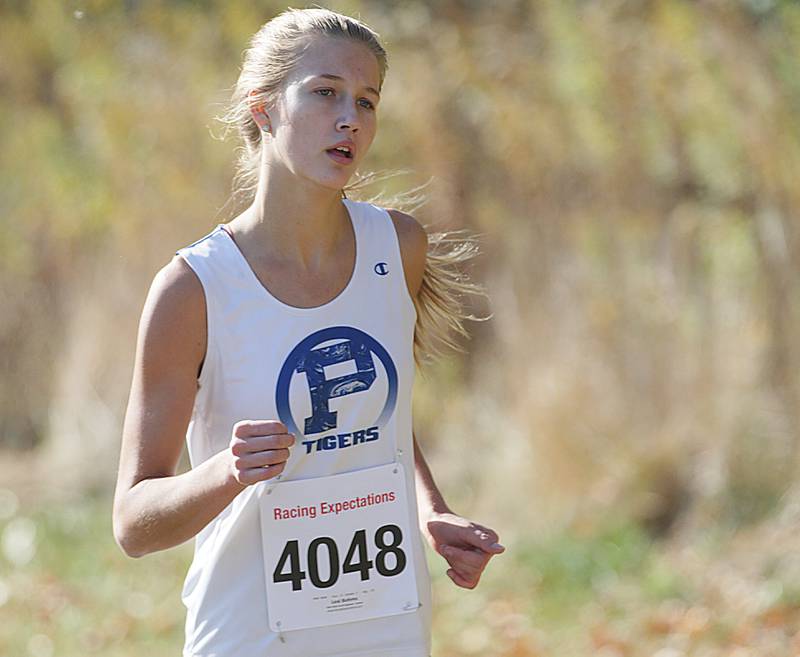 Princeton's Lexi Bohms runs in the Class 1A Regional Cross Country gils race on Saturday, Oct. 22, 2022 at the Seneca FFA Farm in Marseilles.