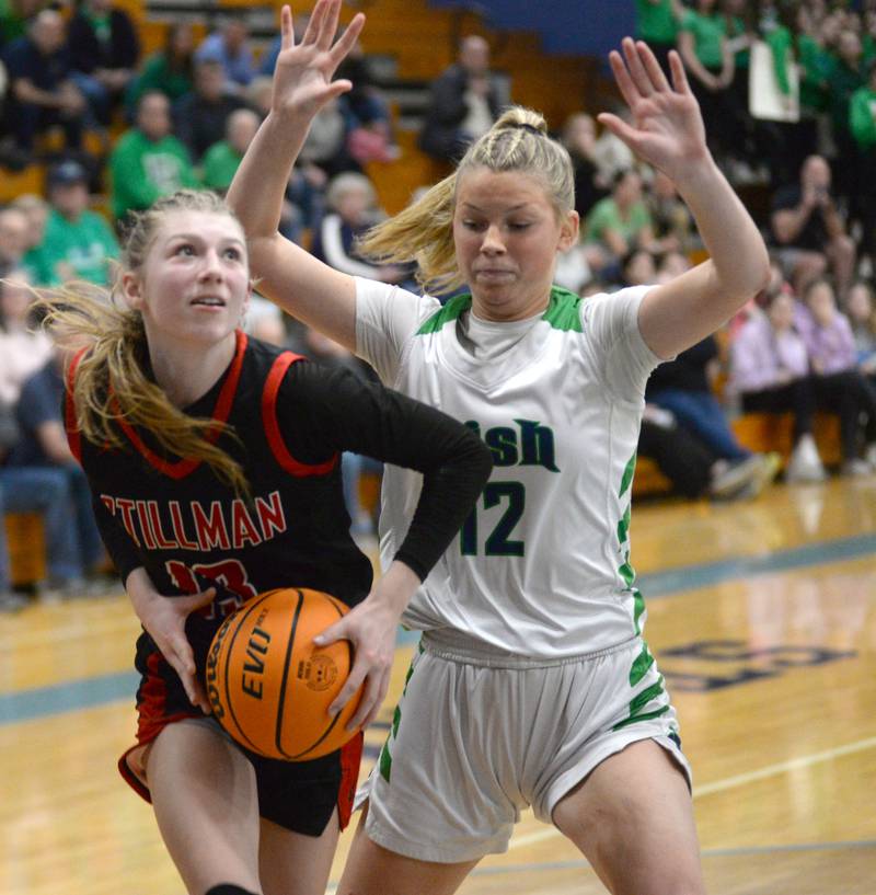 Stillman Valley's Lillian Greene (13) steps past Peoria Notre Dame's Ali Stickelmaier (12) and heads to the basket during the 2A Super-Sectional on Monday, March 3, 2025 at Bureau Valley High School in Manlius.