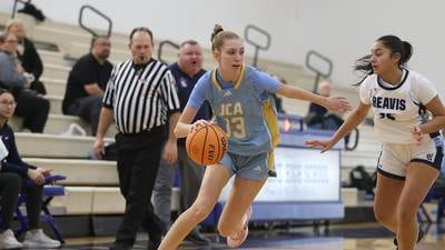 JCA girls basketball continues turnaround season, wins Peotone Holiday Classic championship over Reavis