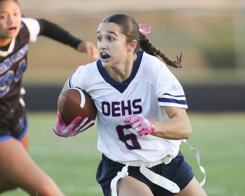 Oswego East's Ashley Gumm (6) turns the corner during Oswego East Regional Final flag football game between St. Charles North at Oswego East Thursday, Oct 9, 2025 in Oswego.