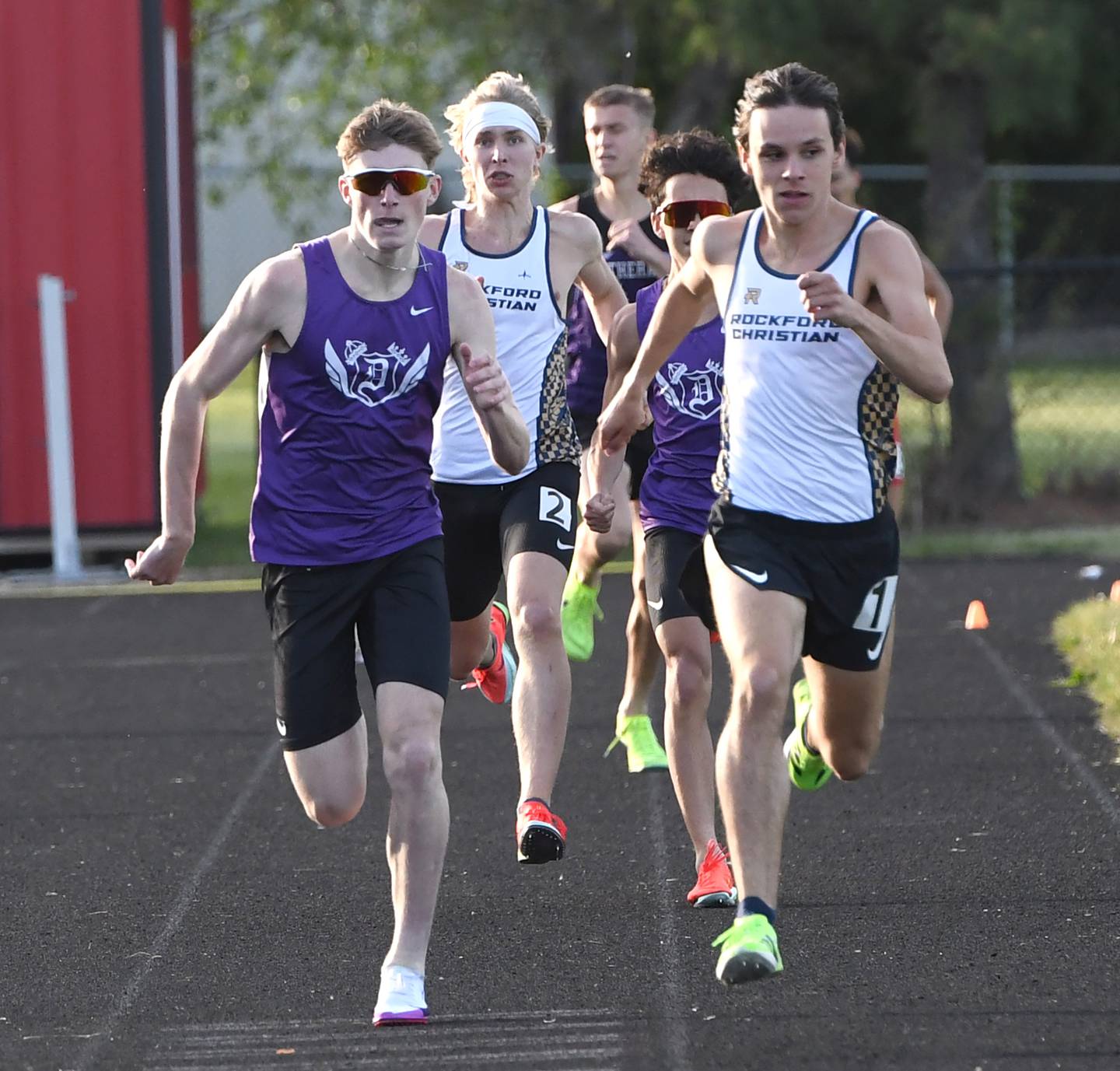 Rockford Christian's Brenden Kastner (right) and Dixon's Averick Wiseman (left) lead Dixon's Abram Garcia and Rockford Christian's Blake Lindberg to the finish line in the 800 meters at the Big Northern Conference Meet at Stillman Valley on Thursday, May 14, 2026.