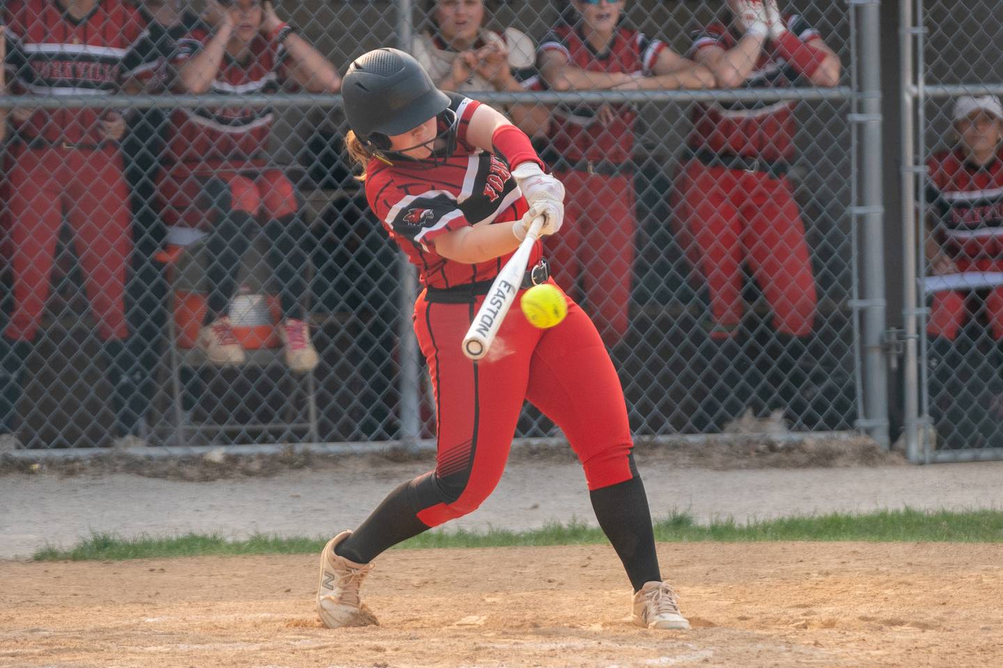 Yorkville's Abi Pool (17) singles in a run against Oswego during a softball game at Yorkville High School on Wednesday, May 17, 2023.