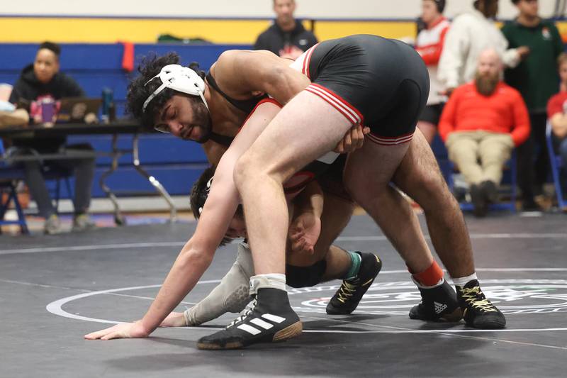 Plainfield North’s Leonardo Tovar works over Yorkville’s Ryan Stoncki in the Southwest Prairie Conference 190 pound Championship at Joliet Central on Saturday, Jan. 20th, 2024.