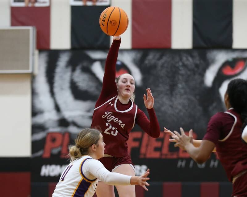 Plainfield North's Sydney Scott (25) passes during their Regional Final basketball game between Downers Grove North at Plainfield North. Feb 20, 2025 in Plainfield.