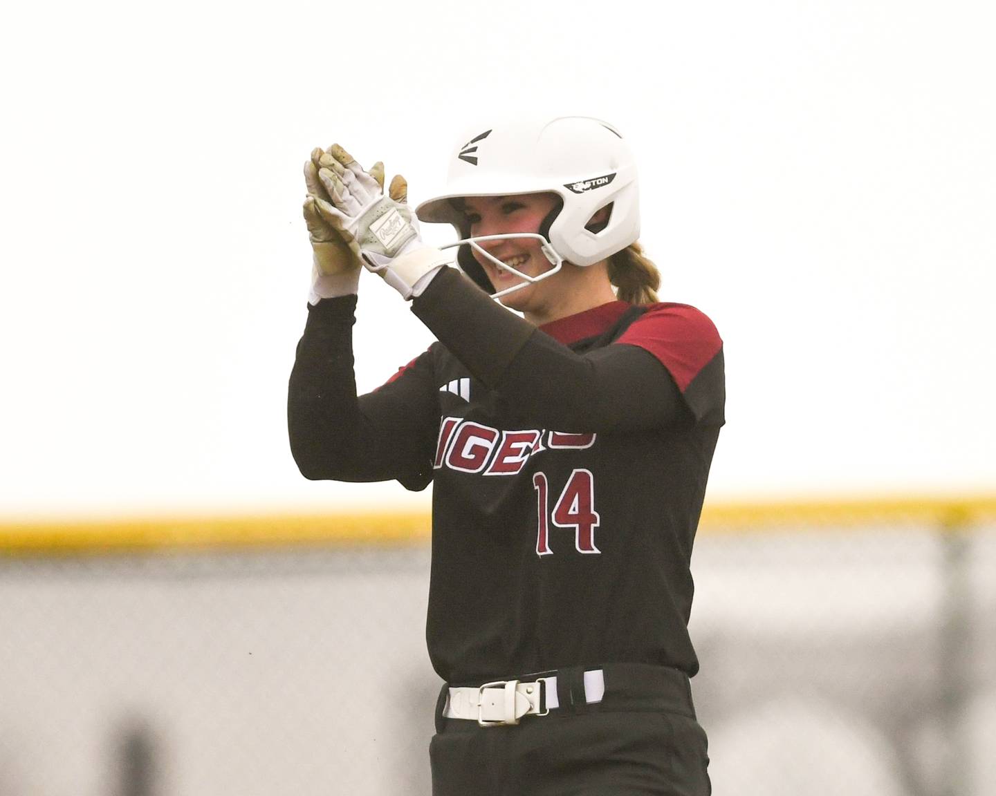 Plainfield North’s Makayla Conrad (14) celebrates a two base hit during the game on Thursday April 17, 2025, while traveling to take on Oswego East.