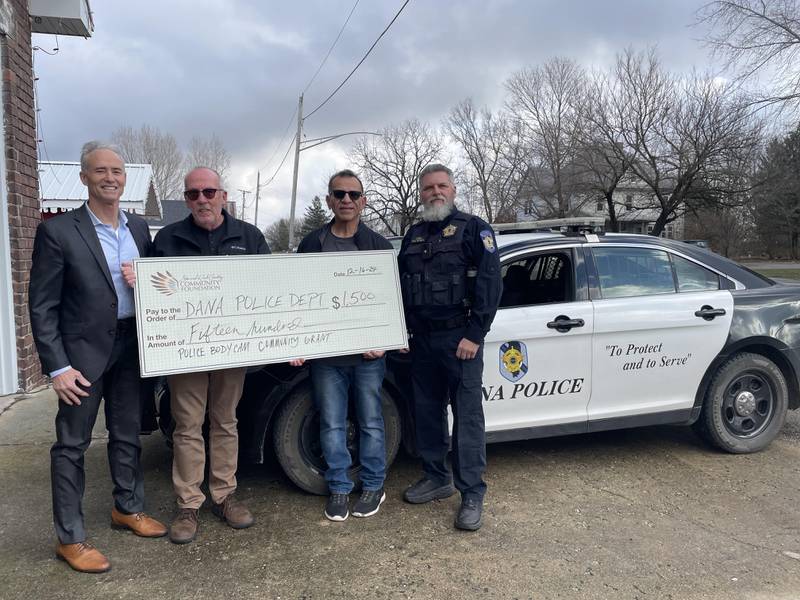 Starved Rock Country Community Foundation President Fran Brolley (from left) SRCCF board member Bill Hunt, Dana Village President Joseph Centeno and Dana Chief of Police Matt Schell pose for a photo recognizing the Foundation's recent grant to the police department.