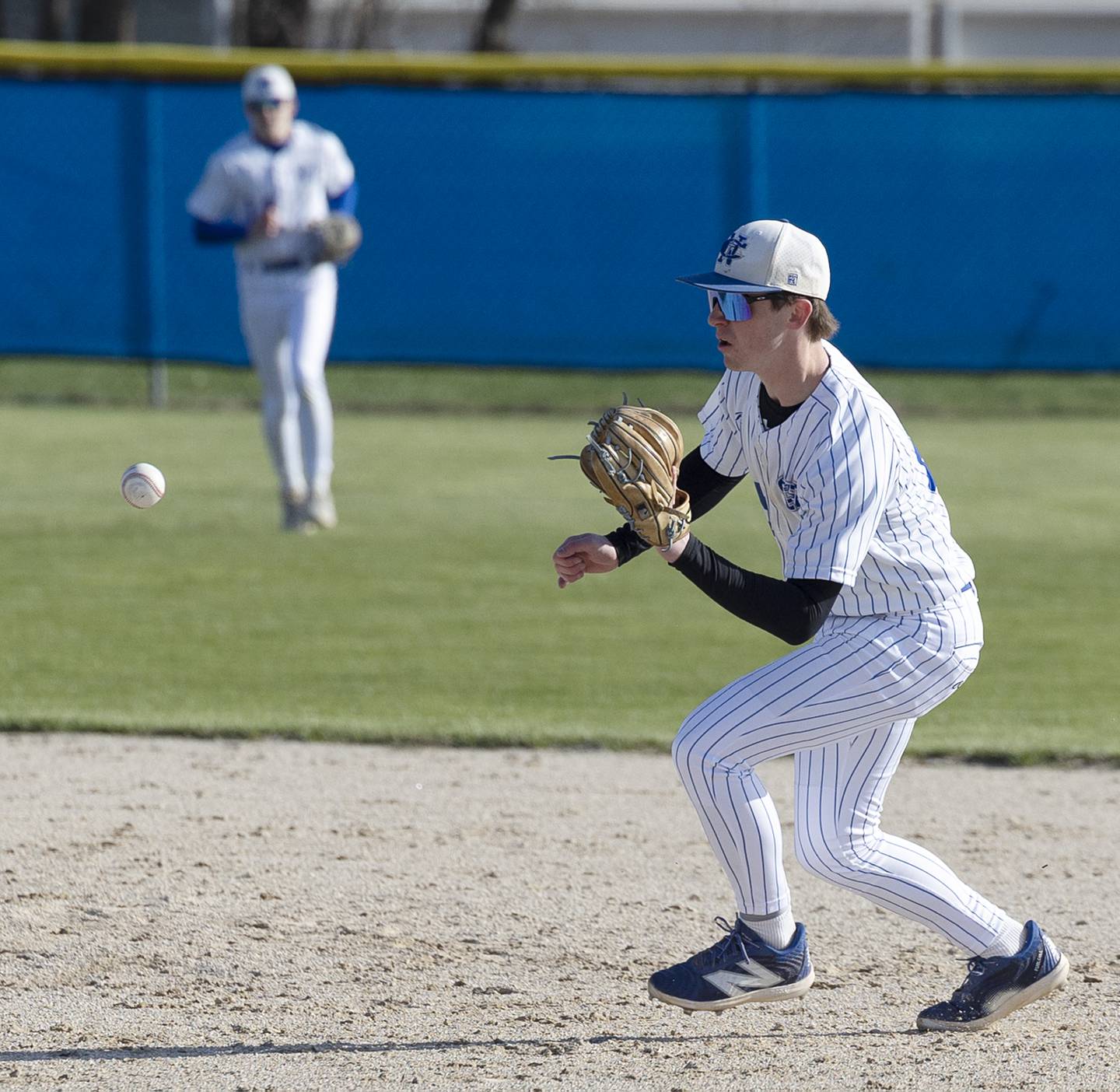 Newman’s Liam Nicklaus fields a grounder for an out against Princeton Monday, April 6, 2026.