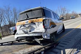 State trooper injured after vehicle struck on I-57