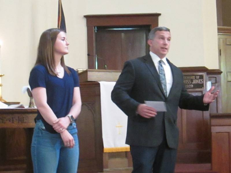 Scholarship recipient Libby Killilea, left, with United Methodist Church of Plano Pastor Steve Saunders.