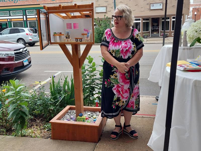 Annette Barr talks Friday, June 28, 2024, about the concept behind a Free Little Art Gallery.