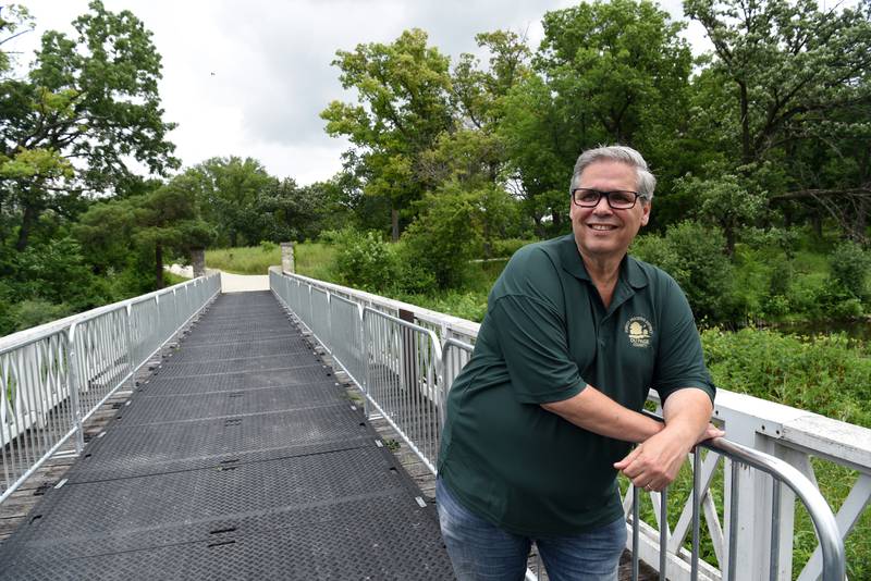 DuPage County Forest Preserve Commissioner Rick Gieser stands on a bridge on the former Cenacle retreat grounds in Warrenville recently. On June 23, 1967, Dr. Martin Luther King Jr. visited the Cenacle retreat property that is now part of Blackwell Forest Preserve to support a tent-in protest.