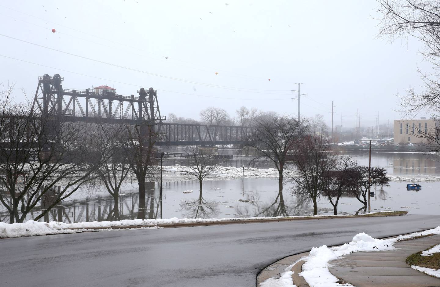The Illinois River floods Allen Park on Friday, Jan. 26, 2024, in Ottawa.