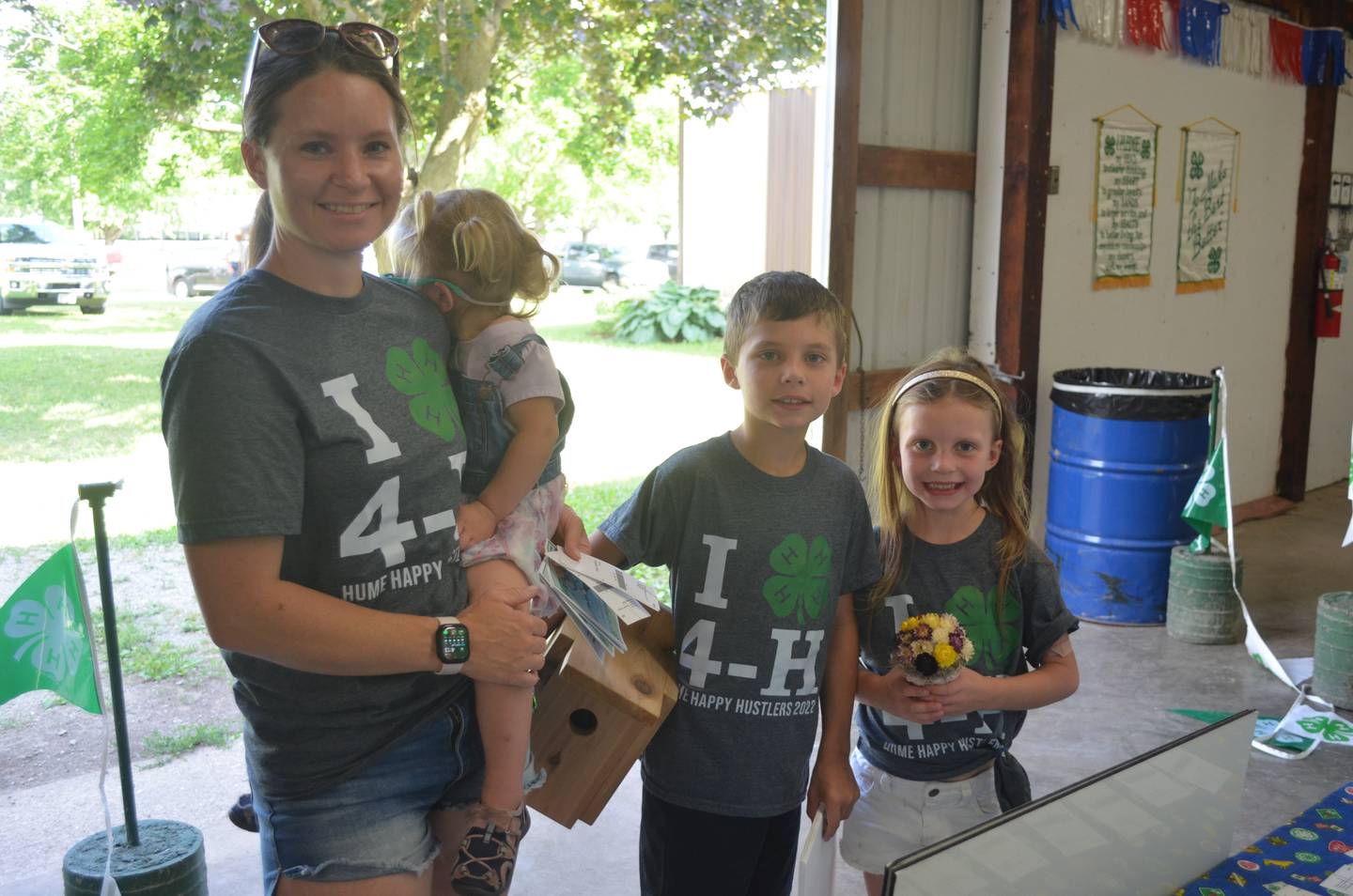 Kelly Foerder and her kids Addie, Reid and Elsie of Rock Falls, dropped off projects at the Whiteside County 4-H Fair last weekend. The kids are members of the Hume Happy Hustlers 4-H Club.