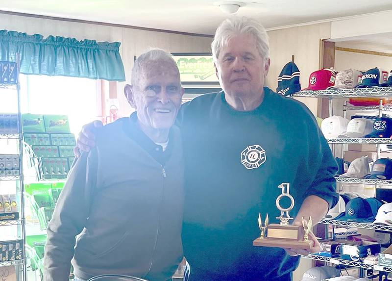 Todd Chastain (right) shot a hole in one at Wyaton Hills on Friday, Nov. 15 while his golfing partner Bob Oaks, 88, shot a par 3 on the same No. 7 hole.