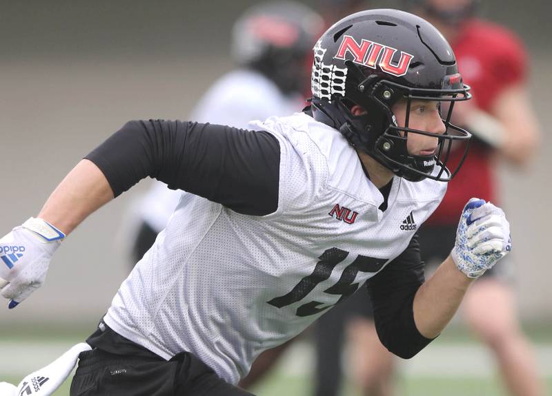 Northern Illinois University wide receiver Cole Tucker, from DeKalb, runs a route during spring practice Wednesday, March 23, 2022, in Huskie Stadium at NIU in DeKalb.