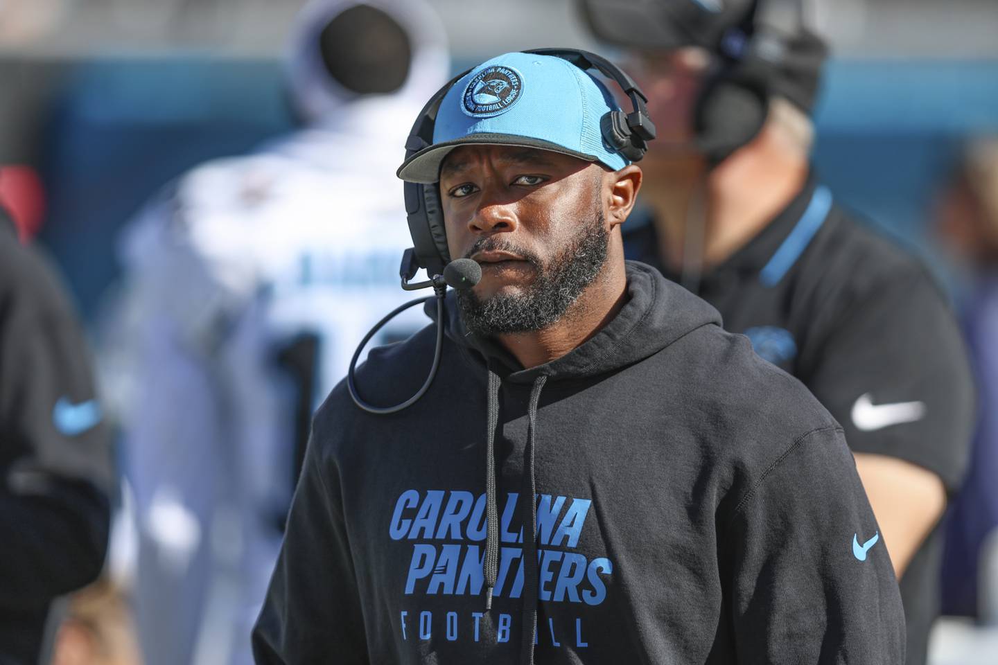 Carolina Panthers offensive coordinator Thomas Brown walks the sidelines before al game against the Jacksonville Jaguars, Sunday, Dec. 31, 2023, in Jacksonville, Fla.