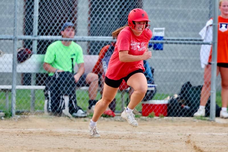 McKenzie Hecht of "Flight" runs to first during Princeton Park District's Fastpitch League championship game Tuesday at Westside Park.