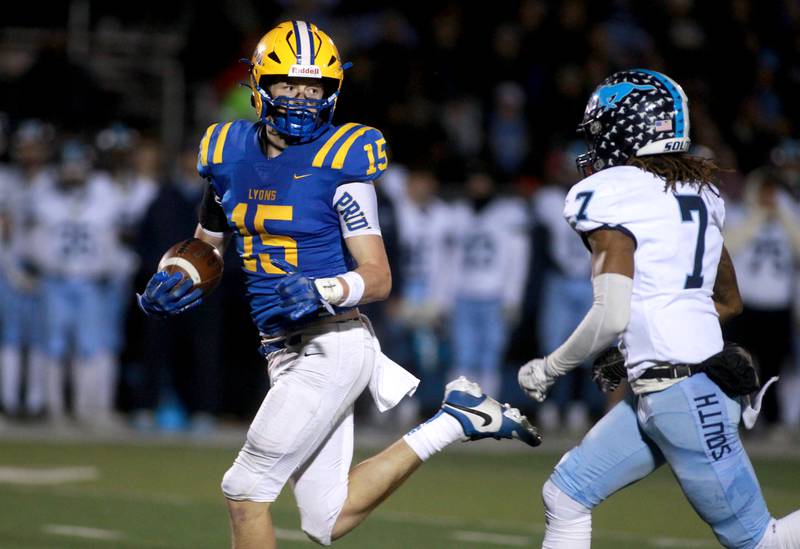 Lyons Township’s Tucker King is chased down by Downers Grove South’s Keon Maggitt during the Class 8A second-round game on Friday, Nov. 8, 2024 at Lyons Township in Western Springs.