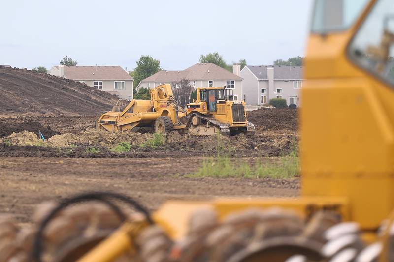 Crews work on clearing the Keller Farm field for the development of residential neighborhood on Wednesday, July 31, 2024 in Plainfield.