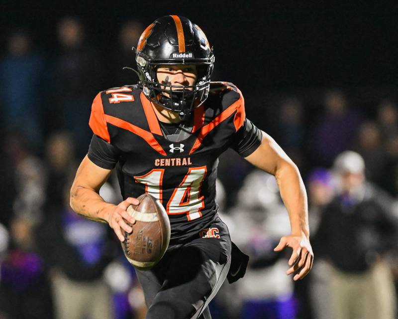 Crystal Lake Central's George Dimopoulos runs for yardage against Fox Valley Conference rival Hampshire on Friday, Oct. 20, 2023 in Crystal Lake.