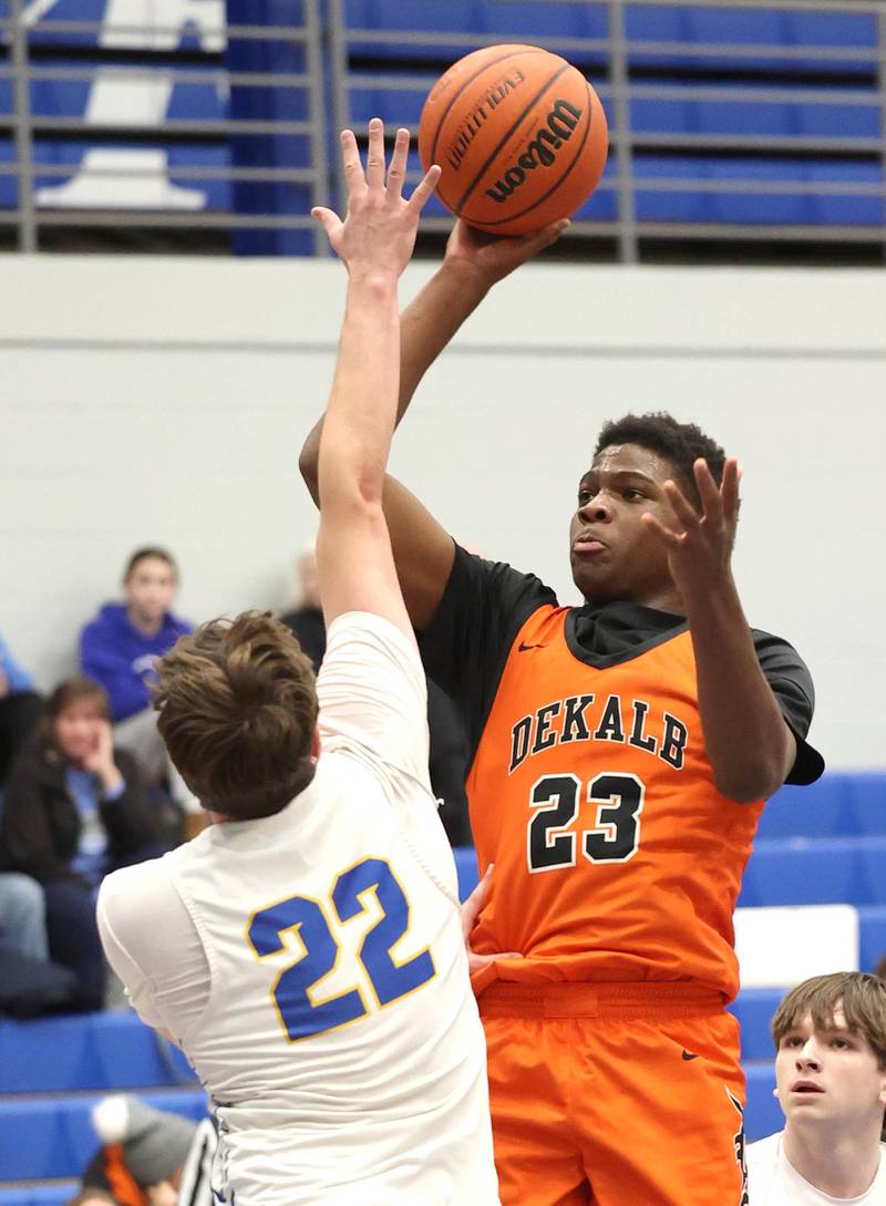 DeKalb’s Davon Grant shoots over Lyons Township's Brady Chambers Monday, Jan. 15, 2023, during their game in the Burlington Central Martin Luther King Jr. boys basketball tournament.