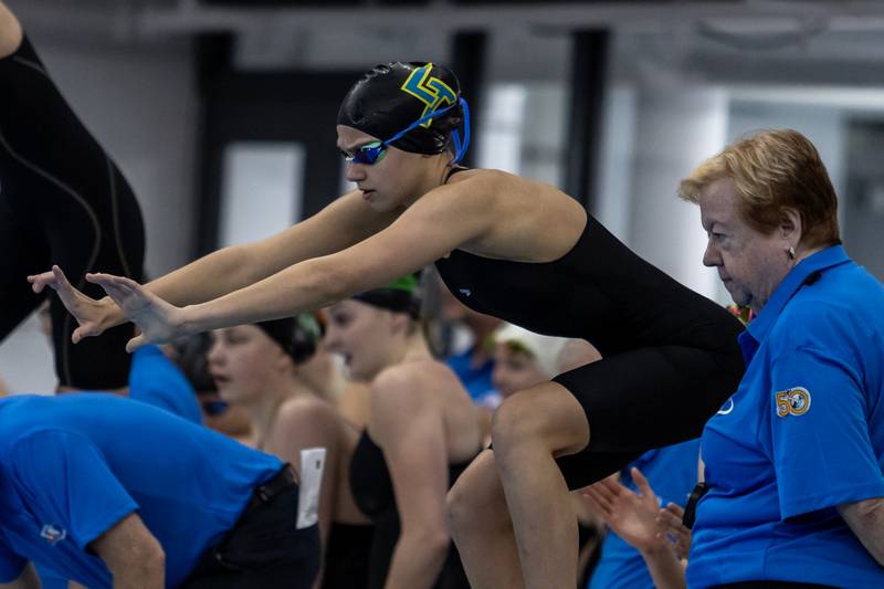 Lyons’s Kylie Thompson competes in the 200 Yard Freestyle Relay during the IHSA Girls State Swimming Preliminaries at FMC Natatorium in Westmont on Nov. 14, 2025.