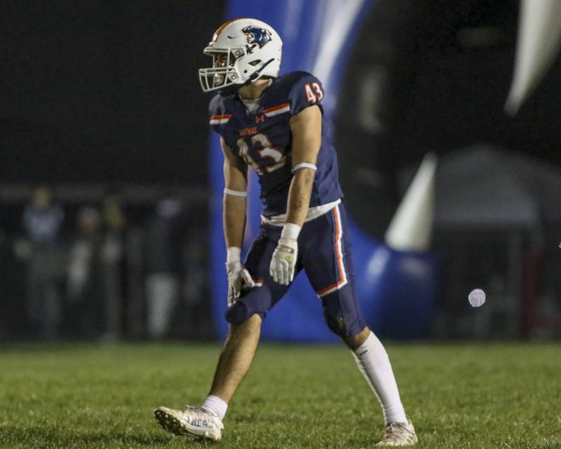 Oswego's Ethan Pilip (43) reacts after making a big defensive stop during football game between Oswego East at Oswego Friday, Oct 17, 2025 in Oswego.