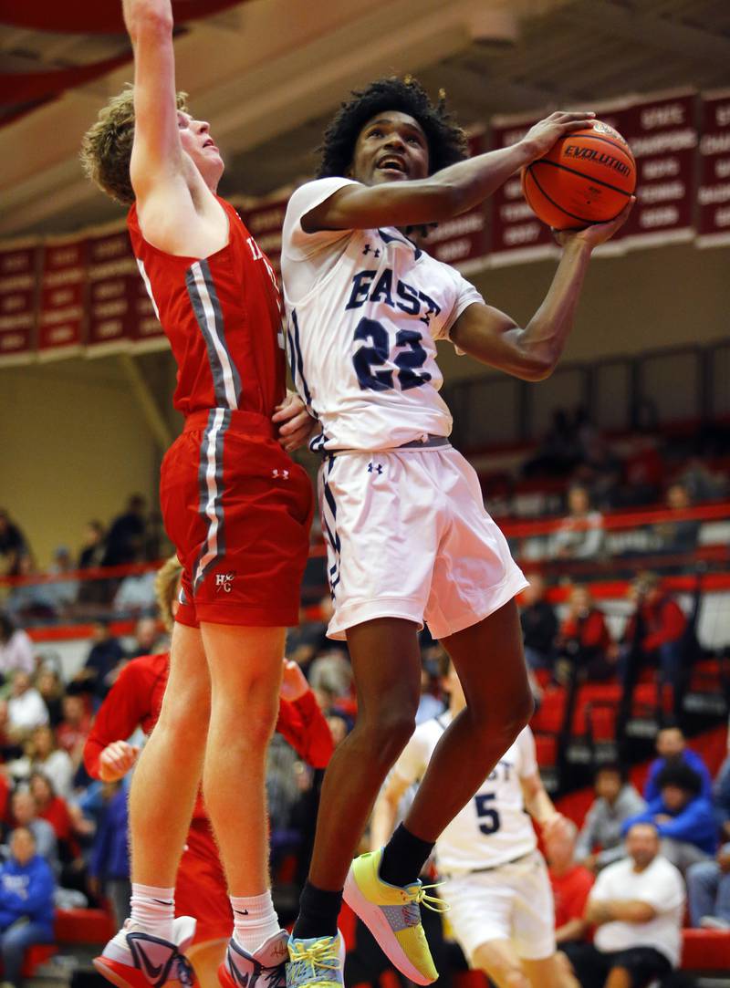 Oswego East's Jehvion Starwood (22) goes up for a basket during the Hinsdale Central Holiday Classic championship game between Oswego East and Hinsdale Central high schools on Thursday, Dec. 29, 2022 in Hinsdale, IL.