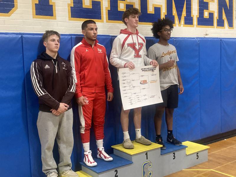 The Joliet Central Sectional place winners at 157 pounds. From left, Vince Tindal of Joliet Catholic, Jovan Vukajlovic of Homewood-Flossmoor, Jack Ferguson of Yorkville and Jaedon Calderon of Lockport.
