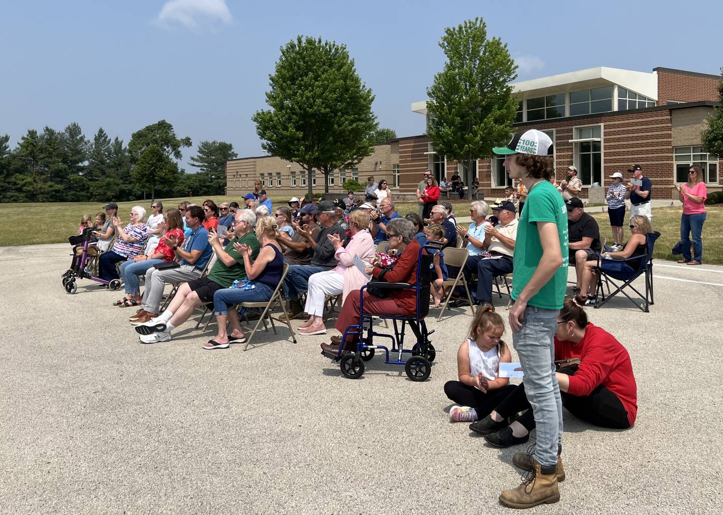 Facing Sycamore Grove, dozens of Sycamore community members attended the 2023 Flag Day celebration outside of Sycamore Middle School on June 14, 2023.