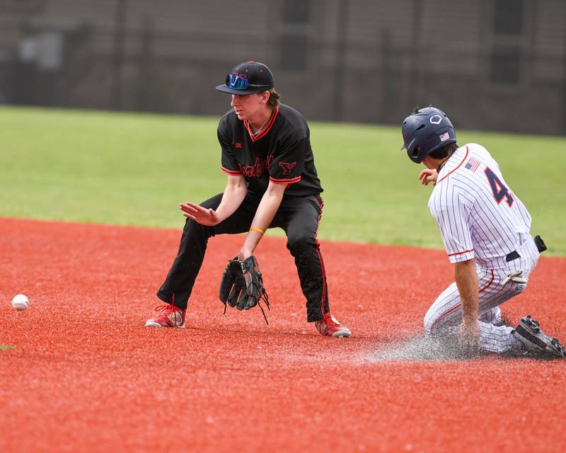Yorkville's Kamden Muell (9) waits for the ball while Romeoville's Nolan Holgado (4) steels second base safely during the regional game on Thursday May 29, 2025, held at Yorkville High School.