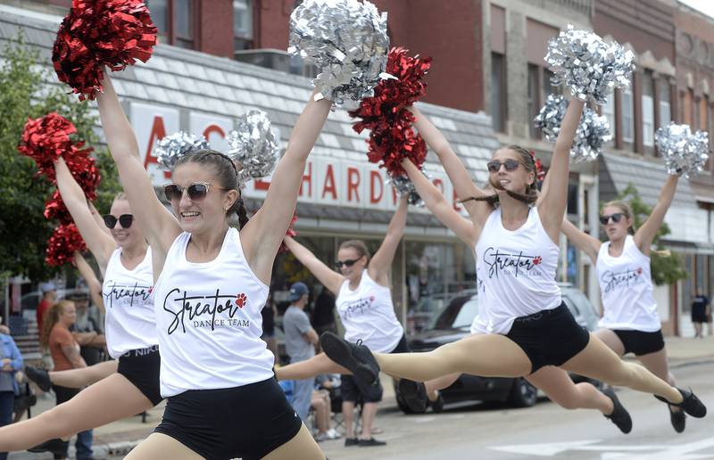 The Streatorettes leap their way down Main Street on Sunday, July 2, 2023, during the Streator Independence Day parade.