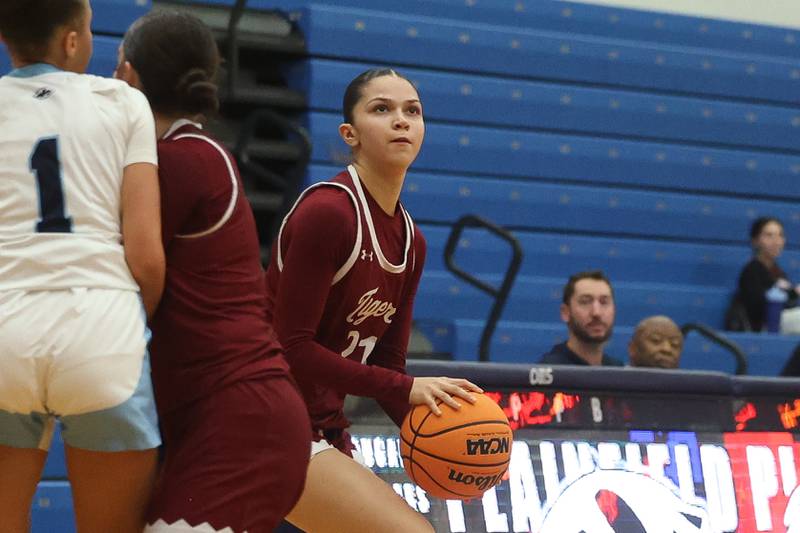 Plainfield North’s Isabella Garcia lines up the outside shot against Plainfield South on Thursday, Jan 9, 2025.