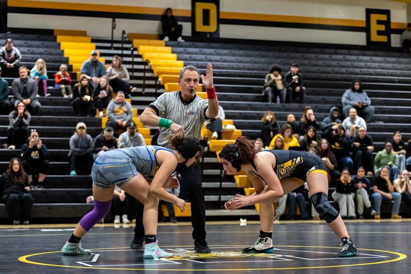 Joliet Central’s Jaylin Ingram and Joliet West’s Vanessa O’Connor and compete in the 145 pound match at Joliet West on Jan. 12, 2026.