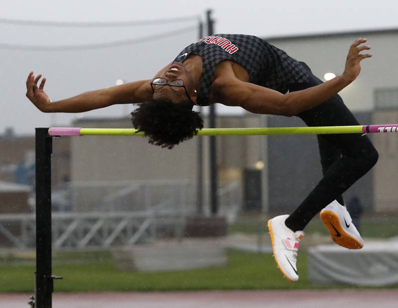 Huntley's McHale Hood high jumps Friday, May 12, 2023, during the Fox Valley Conference Boys Track and Field Meet at Huntley High School.