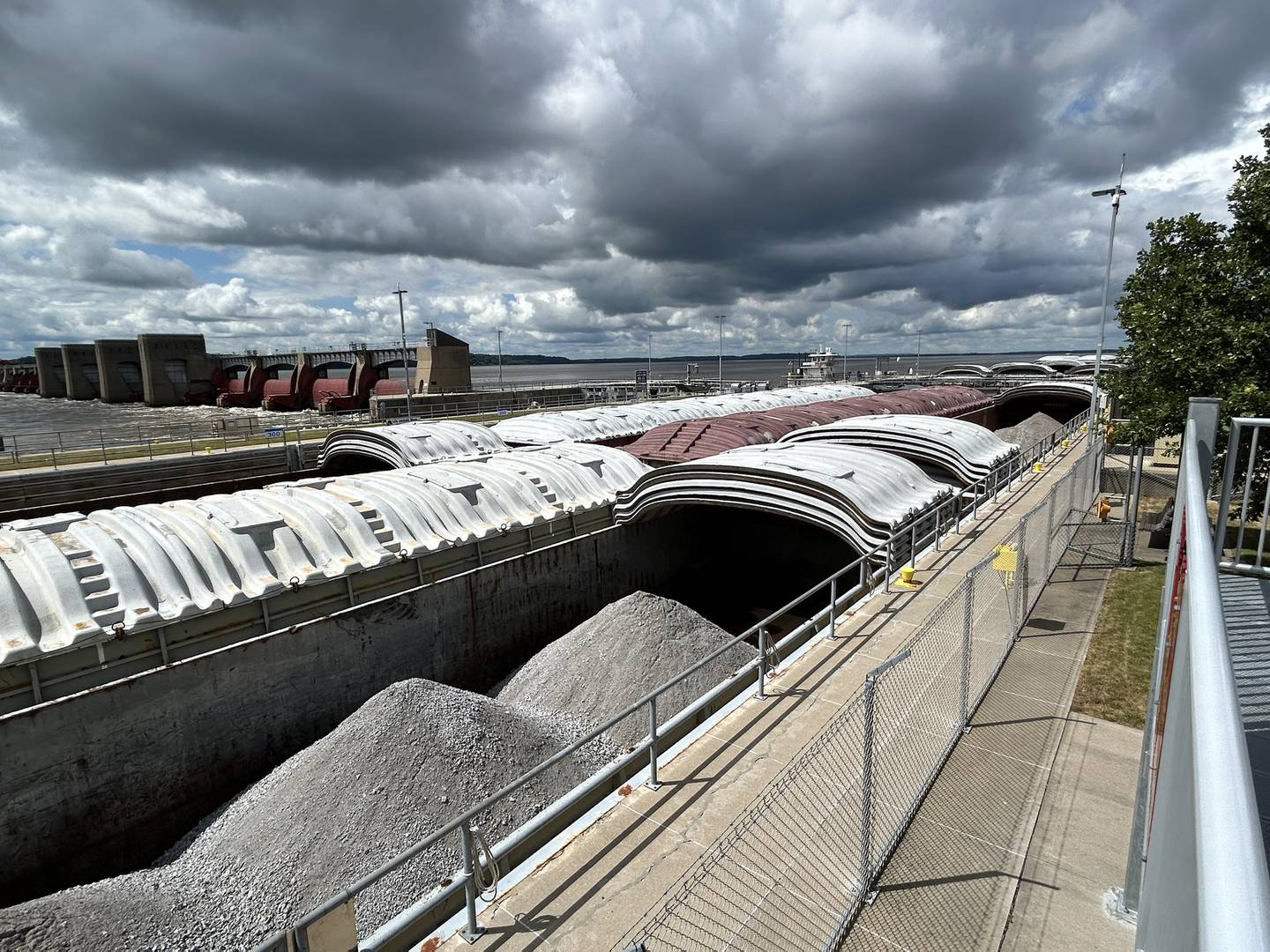 The towboat Neil N Diehl pushes barges up the Mississippi River after passing through the lock at Lock & Dam 13 near Fulton on Sunday, July 6, 2025.