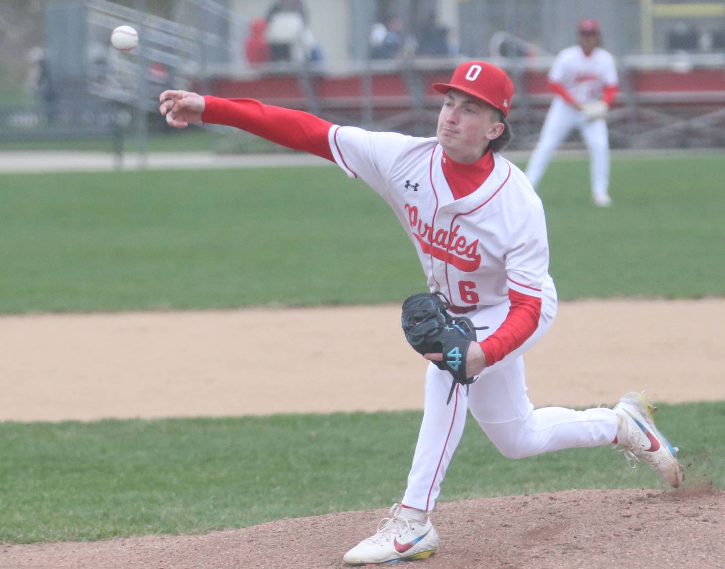 Ottawa pitcher Colin Fowler lets go of a pitch against Hall on Tuesday, April 1, 2025 at Ottawa High School.