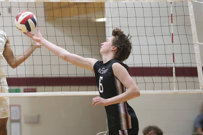 Lockport’s Zack Johnson flips a shot against Joliet West on Tuesday, March 31, 2026 in Joliet.