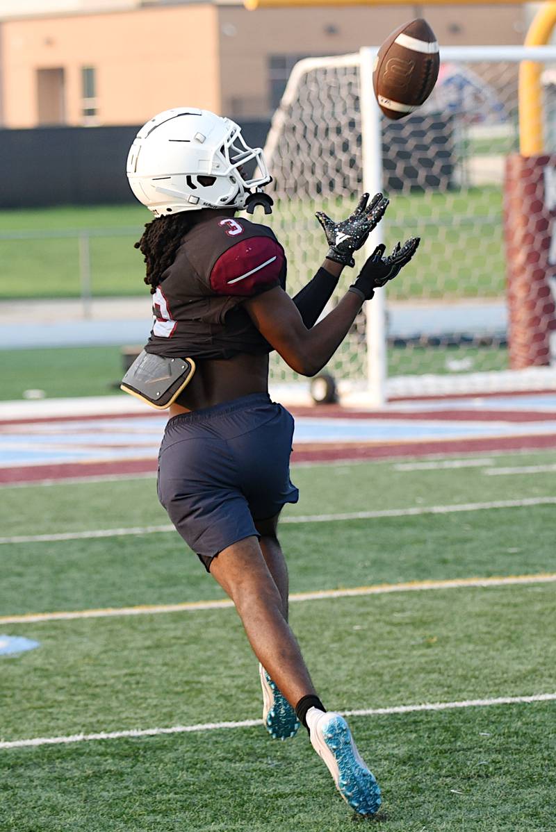 Kankakee's Cedric Terrell III catches a pass during a scrimmage at the Kays' summer camp Thursday, July 31, 2025.