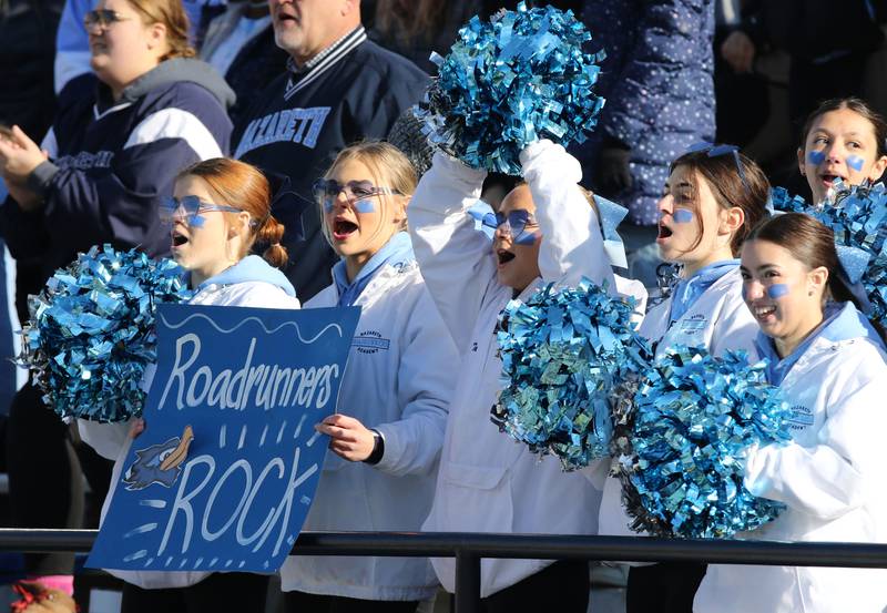 Nazareth fans cheer on their team during their IHSA Class 5A state championship game against Peoria Saturday, Nov. 26, 2022, in Memorial Stadium at the University of Illinois in Champaign.