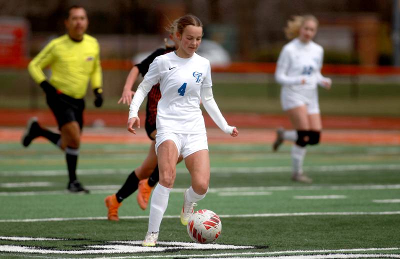 Burlington Central’s Elsa Carlson kicks the ball during a game on Tuesday, April 1, 2025 against St. Charles East in St. Charles.