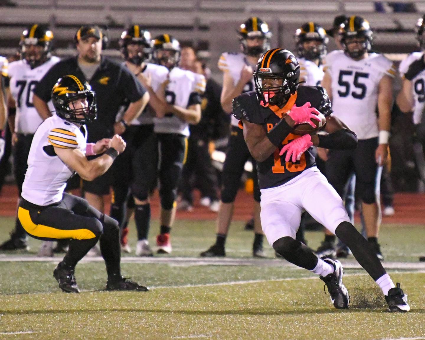 DeKalb's Justin O'Neal, left, brings down Andrews High school ball carrier Alexander Pavelka during the game on Friday Oct. 4, 2024, during the homecoming game held at DeKalb High School.