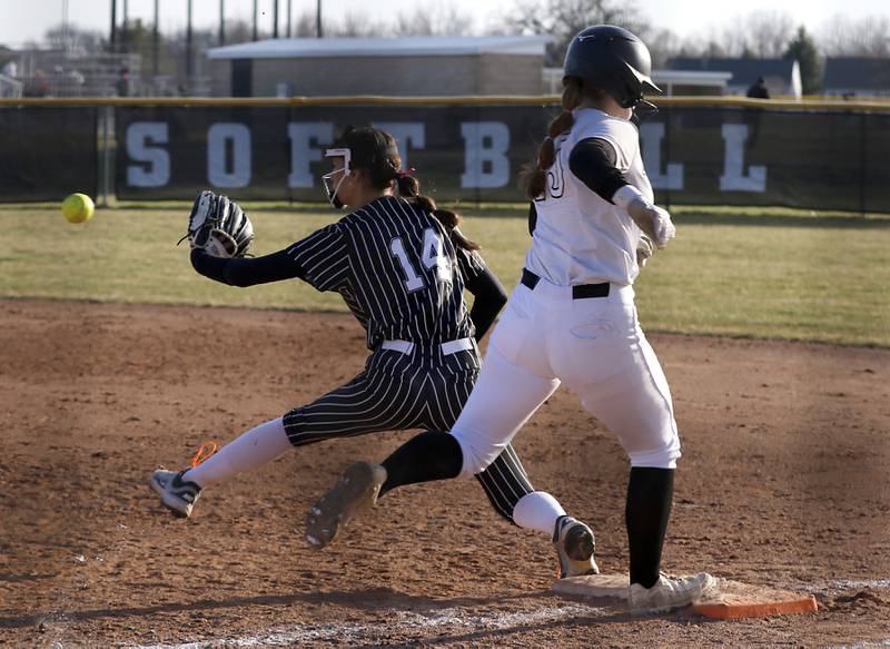 Huntley's Isabella Boskey pages out the throw to Crystal Lake Central's Lily Perocho during Fox Valley Conference softball game on Tuesday, April 8, 2025, at Huntley High School.