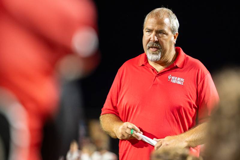 Head Coach, Nick Sterling talks to team after loss on Friday, Sept 5, 2025 at Richard Nesti Stadium in Spring Valley.